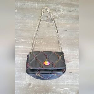 Betsey Johnson Handbag with gold chain detail on strap.